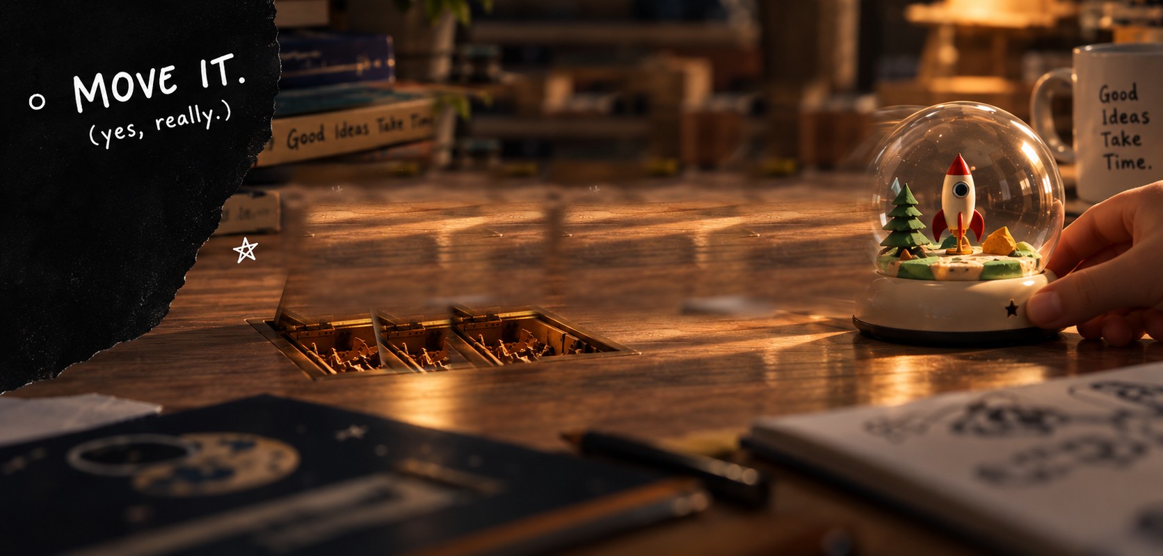 A dimly lit wooden desk with a small, brass-framed hidden compartment and a lid.